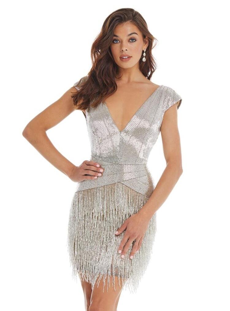 Model with brown hair wearing a silver Ashley Lauren prom gown